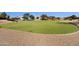 Manicured green space with walking path and view of homes at 474 E Baylor Ln, Gilbert, AZ 85296