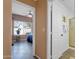 View looking from hallway into bedroom with window and ceiling fan, as well as view of hall bathroom at 474 E Baylor Ln, Gilbert, AZ 85296