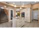 Bright kitchen with a large center island, granite countertops, and stainless steel appliances at 474 E Baylor Ln, Gilbert, AZ 85296