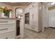 Kitchen island with granite countertop and built-in storage, stainless steel appliances at 474 E Baylor Ln, Gilbert, AZ 85296