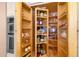 Open shelving pantry with lots of storage space at 474 E Baylor Ln, Gilbert, AZ 85296