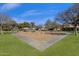 Wide view of community playground with swings and other play equipment at 474 E Baylor Ln, Gilbert, AZ 85296