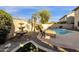 Inviting backyard pool with a water fountain feature and relaxing lounge area at 474 E Baylor Ln, Gilbert, AZ 85296