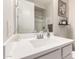 Bright bathroom featuring a white vanity, framed mirror, and decorative accents at 5281 S Red Rock St, Gilbert, AZ 85298