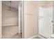 Bathroom area featuring a shower stall and a view into the bedroom at 653 S Catalina St, Gilbert, AZ 85233