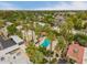 Aerial view of the community showcasing a swimming pool, landscaping, and surrounding homes at 6542 N 7Th Ave # 30, Phoenix, AZ 85013