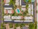 An aerial view showcases the community layout, including a pool, parking, and landscaped grounds at 6542 N 7Th Ave # 30, Phoenix, AZ 85013