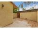 Private back patio area with block wall, ideal for outdoor seating and enjoying the peaceful surroundings at 6542 N 7Th Ave # 30, Phoenix, AZ 85013