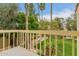 Balcony overlooking lush landscaping and mature palm trees at 6542 N 7Th Ave # 30, Phoenix, AZ 85013