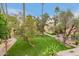Scenic community green space with mature trees and well-maintained lawns, perfect for relaxation and outdoor activities at 6542 N 7Th Ave # 30, Phoenix, AZ 85013