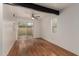 Bright dining area features wood floors and sliding glass doors to the outdoors at 6542 N 7Th Ave # 30, Phoenix, AZ 85013