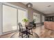 Cozy breakfast nook featuring sliding doors and a round table with comfortable seating at 6881 W Greenbriar Dr, Glendale, AZ 85308