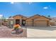 Charming single-story home with three-car garage and low maintenance desert landscaping at 6881 W Greenbriar Dr, Glendale, AZ 85308