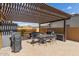 A shaded outdoor dining area offers comfortable seating for enjoying meals al fresco at 6881 W Greenbriar Dr, Glendale, AZ 85308