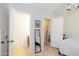 Bright bedroom with attached bath and powder room, featuring neutral colors, ceiling fan, and ample lighting at 710 S Beck Ave, Tempe, AZ 85281