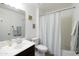 Clean bathroom with a shower/tub combo and vanity with sink at 710 S Beck Ave, Tempe, AZ 85281