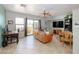 Cozy living room area with leather sofa and a view to the outdoor patio through sliding glass doors at 710 S Beck Ave, Tempe, AZ 85281