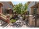 Picturesque street view featuring well-maintained townhomes, lush landscaping, and inviting brick sidewalks at 710 S Beck Ave, Tempe, AZ 85281