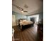 Spacious bedroom featuring a comfortable bed, closet, and a ceiling fan at 9302 E Broadway Rd # 64, Mesa, AZ 85208