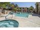 Relaxing community pool and spa surrounded by mature landscaping at 9550 E Thunderbird Rd # 259, Scottsdale, AZ 85260