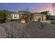 Beautiful desert home with low maintenance landscaping, and a three car garage at 12593 E Desert Cove Ave, Scottsdale, AZ 85259