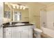 Bathroom with white vanity, cabinets, and tile flooring at 1295 N Ash St # 125, Gilbert, AZ 85233
