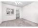 Bedroom with ceiling fan and a view into a closet at 1295 N Ash St # 125, Gilbert, AZ 85233