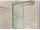 Shower with chrome trimmed sliding glass doors and chrome fixtures at 1295 N Ash St # 125, Gilbert, AZ 85233