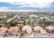 Aerial view of home in a residential community, showcasing tile roofs, landscaping and nearby businesses at 1409 W Maria Ln, Tempe, AZ 85284