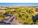 Aerial view of the neighborhood park with playground, ramada, and ample green space at 1409 W Maria Ln, Tempe, AZ 85284