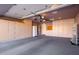 Well-organized garage featuring plenty of storage space and modern lighting at 1409 W Maria Ln, Tempe, AZ 85284