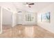 Bright and airy living room featuring tile flooring, white walls, and large windows for ample natural light at 1409 W Maria Ln, Tempe, AZ 85284