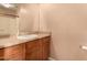 Bathroom featuring a sink, vanity, mirror and shower with neutral walls at 1585 E Jeanne Ln, San Tan Valley, AZ 85140