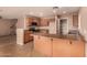 Well-equipped kitchen with tile floors, ample counter space, and modern appliances at 1585 E Jeanne Ln, San Tan Valley, AZ 85140