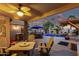 Outdoor area with a covered patio, pool, built-in barbecue, and seating area at 17813 N Encanto Dr, Surprise, AZ 85374