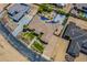 Aerial shot of a luxurious property featuring solar panels and a basketball court at 18131 W Palo Verde Ct, Litchfield Park, AZ 85340