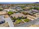 Sprawling property features lush landscaping, a sparkling pool, and modern architecture in a desirable neighborhood at 18131 W Palo Verde Ct, Litchfield Park, AZ 85340