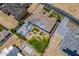 Luxury home with a basketball court, solar panels, landscaping, and a pool under construction in the backyard at 18131 W Palo Verde Ct, Litchfield Park, AZ 85340