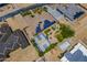 Expansive home with solar panels, basketball court, and landscaped backyard, offering luxury and recreation at 18131 W Palo Verde Ct, Litchfield Park, AZ 85340