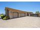 Spacious three-car garage offers ample parking and storage, adding convenience to this desert home at 18131 W Palo Verde Ct, Litchfield Park, AZ 85340