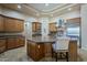 Spacious gourmet kitchen with stainless steel appliances and kitchen island at 18131 W Palo Verde Ct, Litchfield Park, AZ 85340