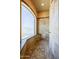 Contemporary tiled shower with glass window and built-in bench at 18131 W Palo Verde Ct, Litchfield Park, AZ 85340