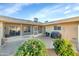 Spacious backyard with lush greenery, a patio area and perfect for outdoor gatherings at 18655 N Palomar Dr, Sun City West, AZ 85375