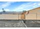 Street view showcasing a well-maintained home with an American flag and an attached garage at 18655 N Palomar Dr, Sun City West, AZ 85375