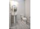 Charming half bath featuring a classic pedestal sink, tile flooring, and neutral color scheme at 19139 N 260Th Ave, Buckeye, AZ 85396