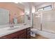 Bathroom with vanity and shower and tub combo at 20934 N Sweet Dreams Dr, Maricopa, AZ 85138
