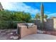 Built-in outdoor kitchen area with stainless steel grill and stone counter, perfect for entertaining guests at 20934 N Sweet Dreams Dr, Maricopa, AZ 85138