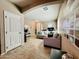 Open-concept living space features tile flooring and neutral color palette at 21868 S 215Th St, Queen Creek, AZ 85142
