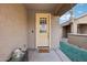 Welcoming front door with glass panel and covered porch at 22714 N Chase Dr, Maricopa, AZ 85138