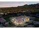 A luxury home surrounded by desert landscaping and mountain views at 25572 N 113Th Way, Scottsdale, AZ 85255